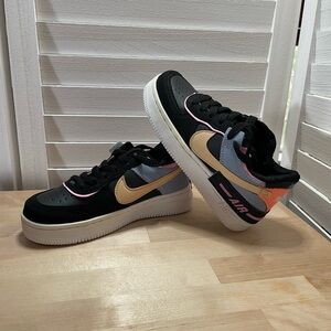 Kids Black Sneakers with Peach Accent and Pink Trim